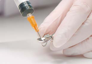 Applying glue with a dispenser