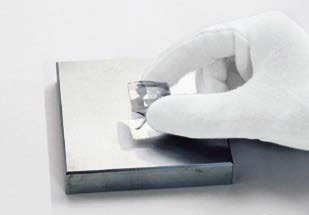 Pressing a crystal into UV glue