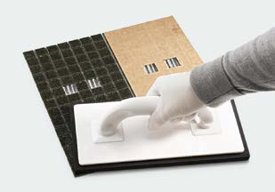 Applying tile glue to prepared base