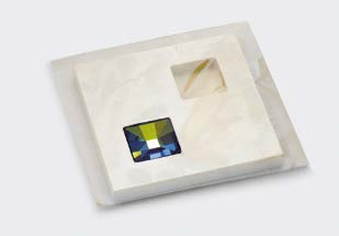 Gluing crystal into cavity through protective film