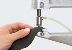 Carrier material positioned for Rose Pin application with a fly press