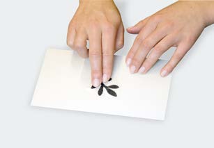 Positioning the motif and pressing it down