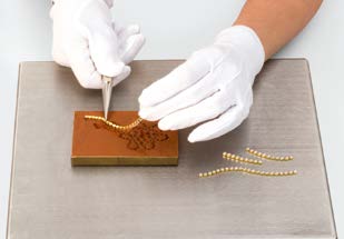Put the Cupchain in the solder mold.